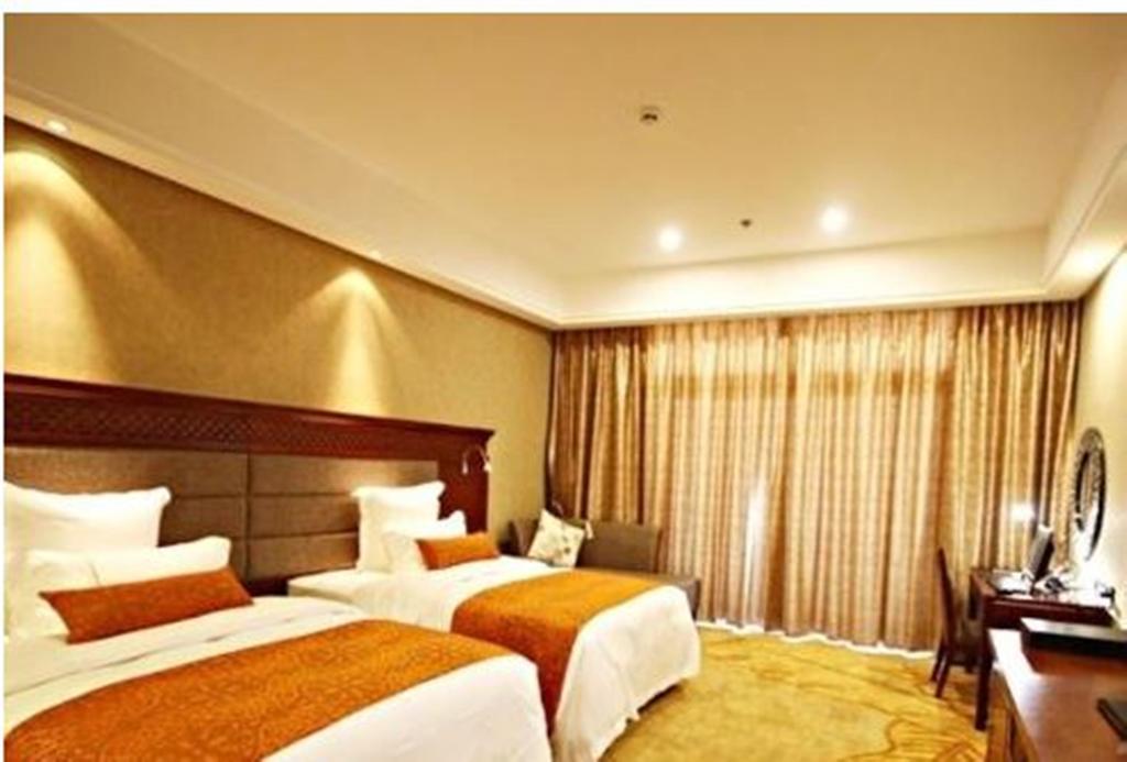 Ramada Plaza Xishuangbanna Hotel Bagian luar foto